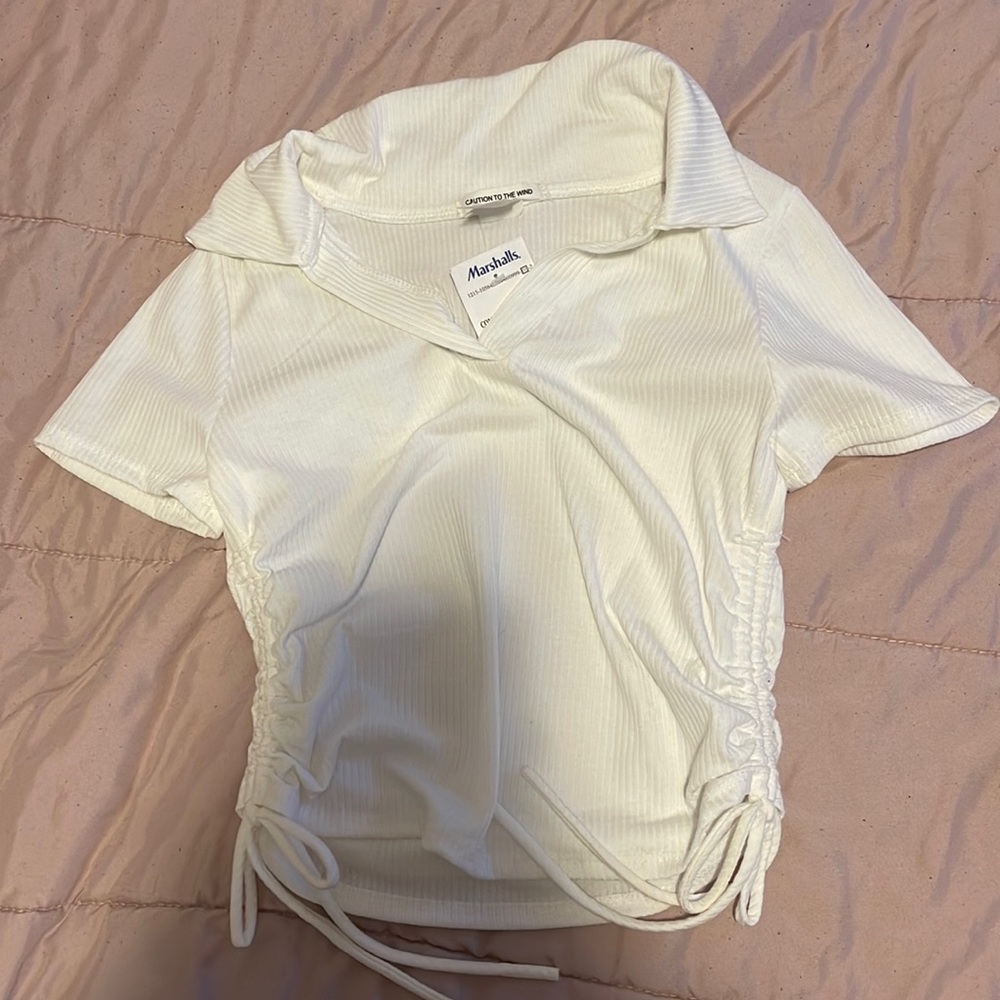 Side touched white collared top